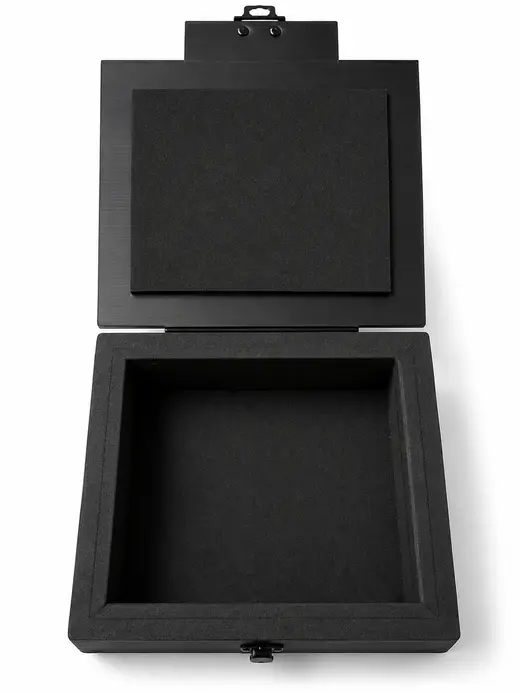 Black conductive foam ESD box opened to show the lined lid and cavity, EMS Technologies