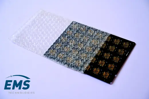 Anti-static bubble bag protecting a printed circuit board, EMS Technologies ESD packing