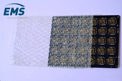 Anti-static bubble bag protecting a printed circuit board, EMS Technologies ESD packing
