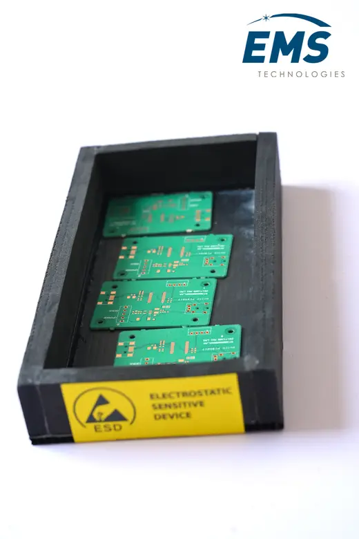 EVA ESD bin holding circuit boards, electrostatic-sensitive-device labelled, EMS Technologies