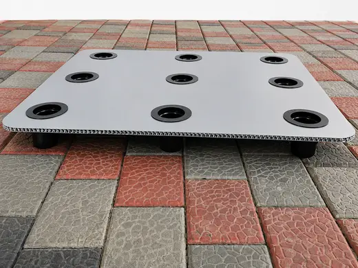 Grey PP honeycomb ESD pallet top on moulded feet, for moving loads without a timber pallet, EMS Technologies