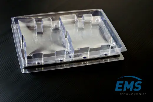 Closed clear PET blister pack with two moulded pockets for ESD-safe component packing, EMS Technologies