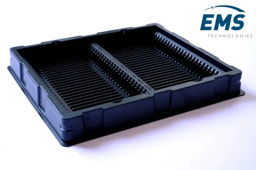 Black HIPS slotted base tray with moulded board channels, shown without its PET lid, EMS Technologies