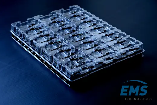 Clear anti-static PET pocket tray seated on a black conductive base tray, EMS Technologies