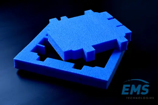 Blue EVA conductive foam insert cut to component geometry, EMS Technologies