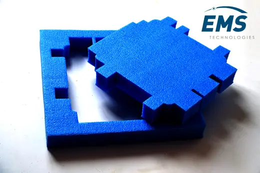 Blue EVA conductive foam insert cut to component geometry, EMS Technologies