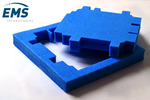 Blue EVA conductive foam insert cut to component geometry, EMS Technologies
